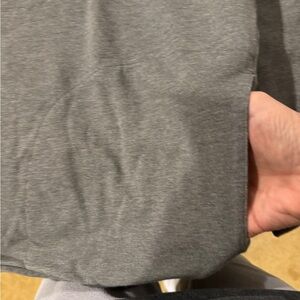 Travis Matthews 1/2 zip knit shirt with pockets- sizeS